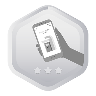 Hand holding a phone with the Exxon Mobil Rewards+ app on screen.